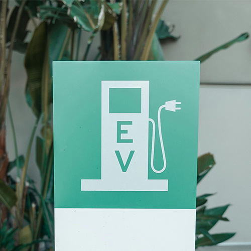 An electric vehicle charger sign.